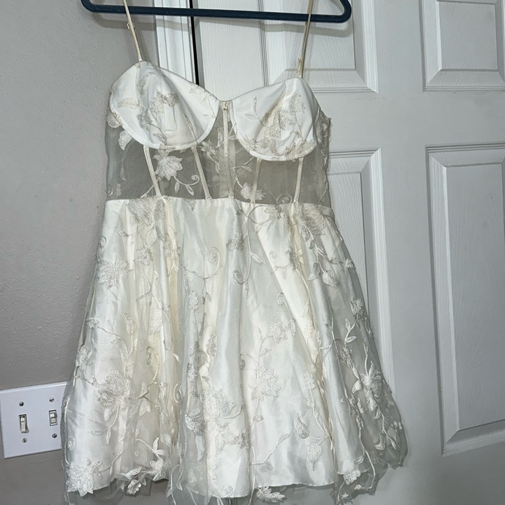 Super cute, white lace, mini dress, perfect for any event!
